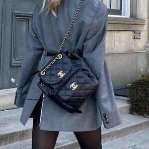 Vintage America Black Quilted Backpack with Gold Hardware